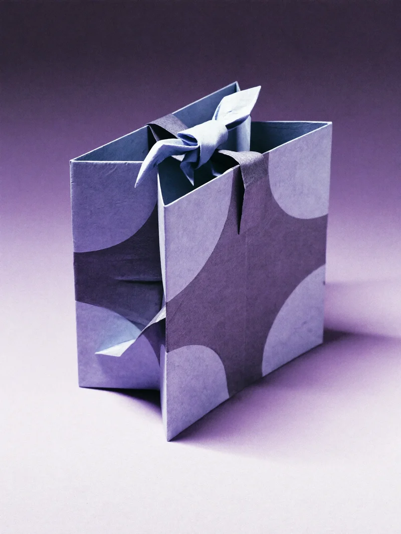 Illustration d'un écrin de papier plié, concept d'emballage cadeau